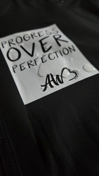 Progress Over Perfection Rain Jacket
